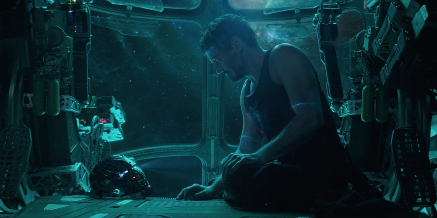 Tony Stark with Iron Man helmet projection in Avengers Endgame