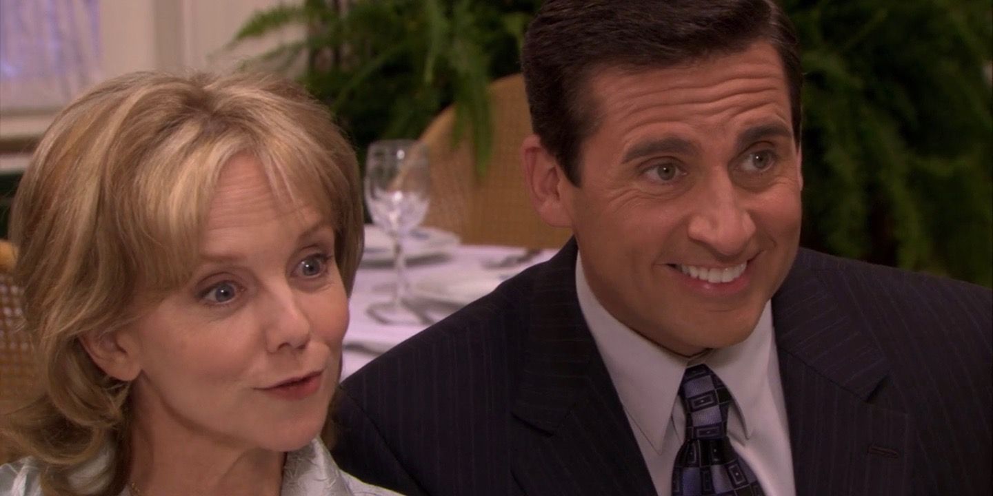 Michael smiling while sitting next to Pam's mom