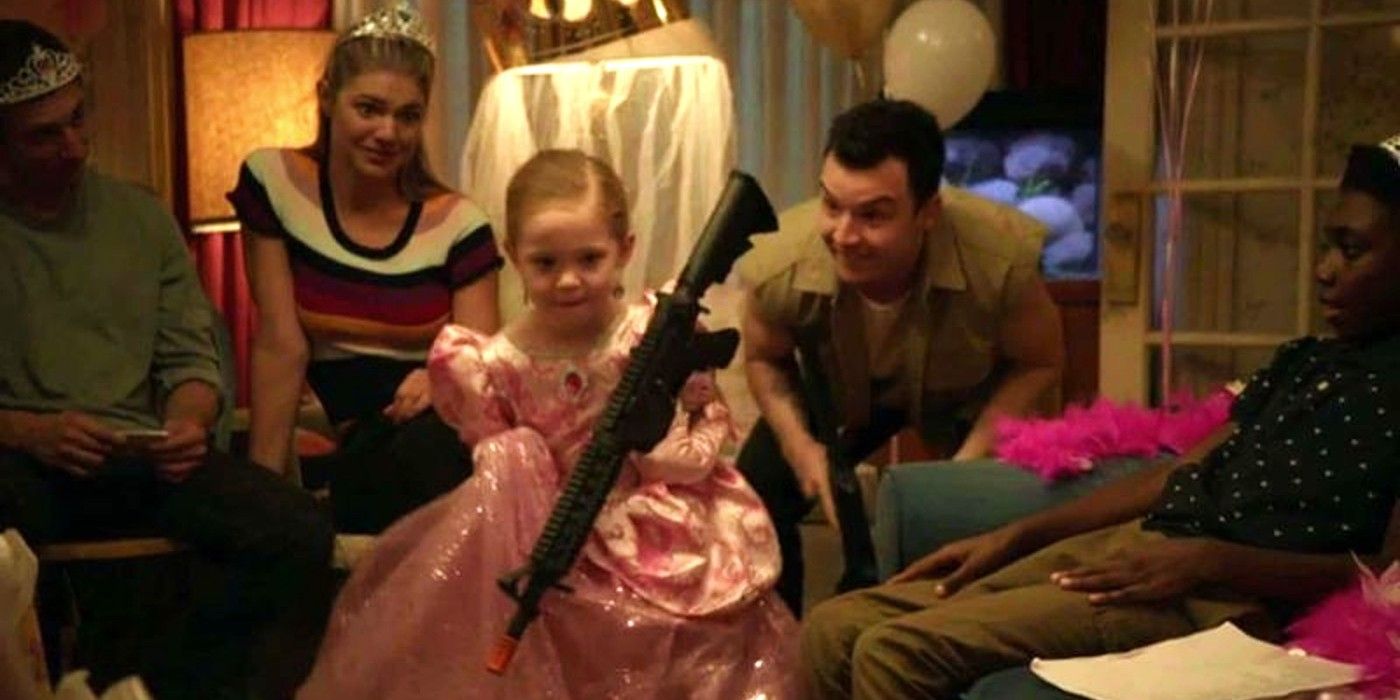 Franny Gallagher holding automatic rifle and chased by Mickey Milkovich