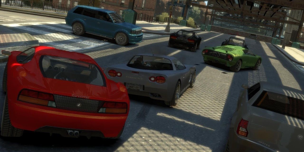 Various cars racing down the street in GTA IV