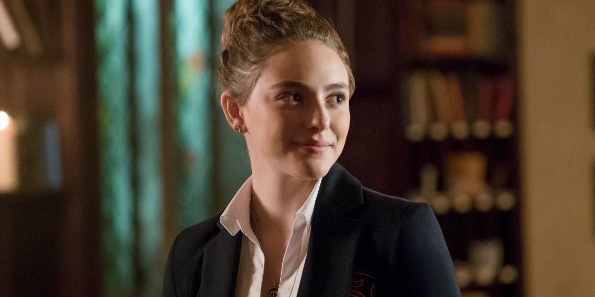 Hope Mikaelson in a bun in a shirt and black suit in Legacies