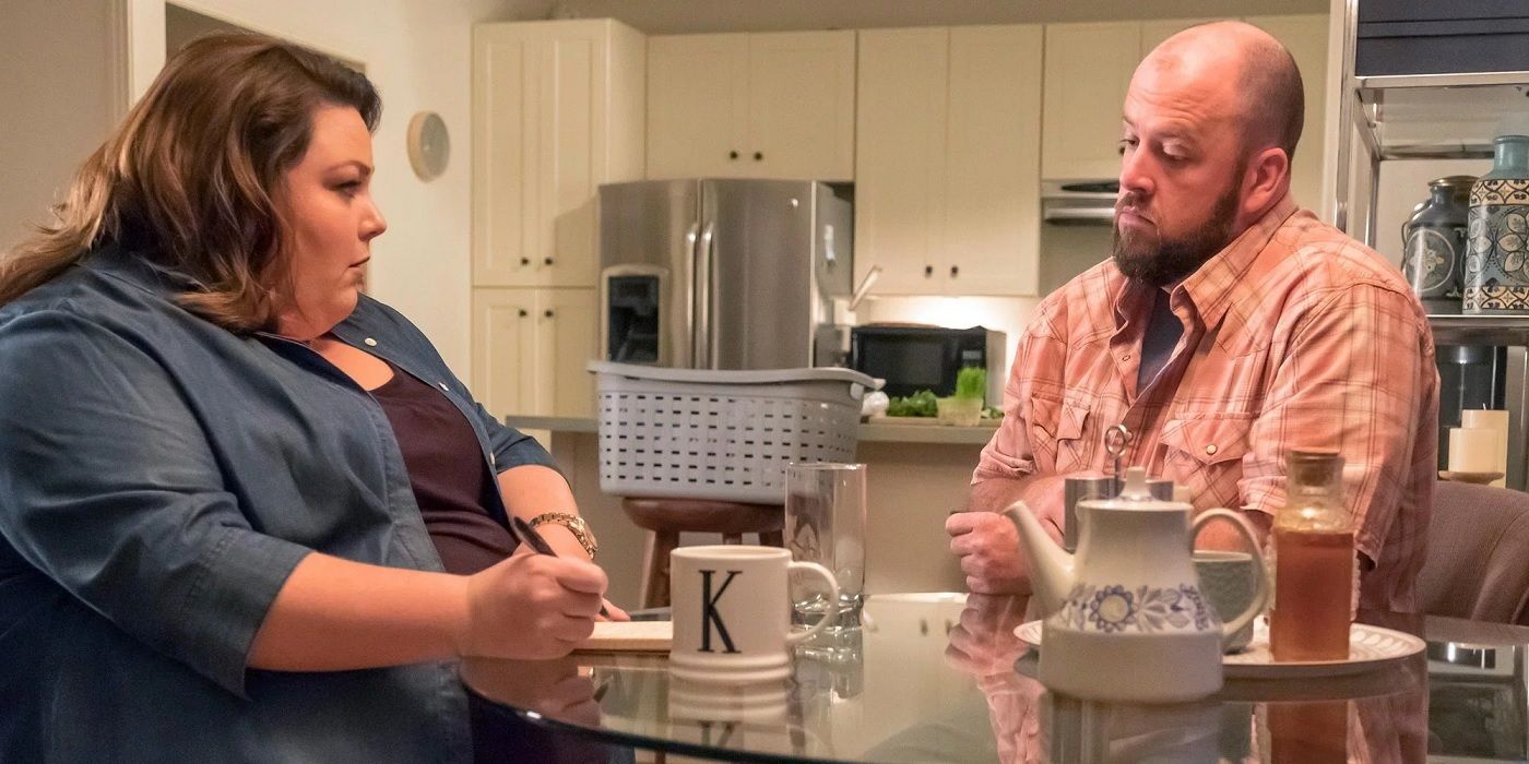 Kate and Toby sit at the kitchen table in This Is Us