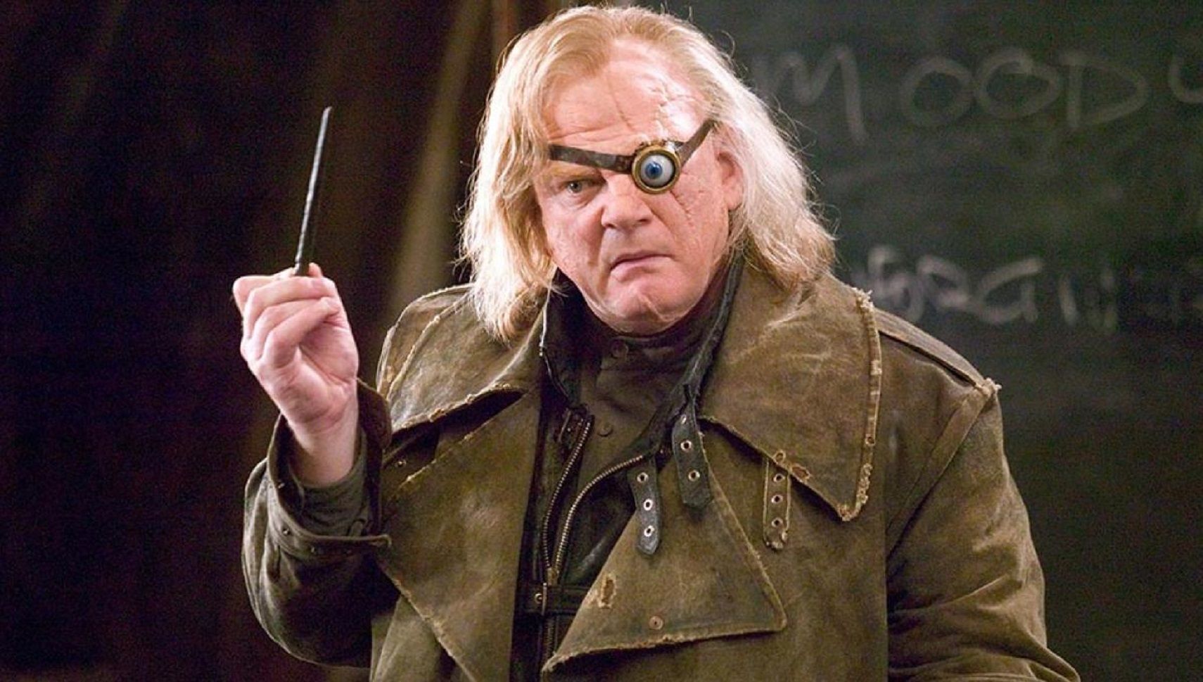 Mad-Eye at class raising his wand in Harry Potter and the Goblet of Fire.