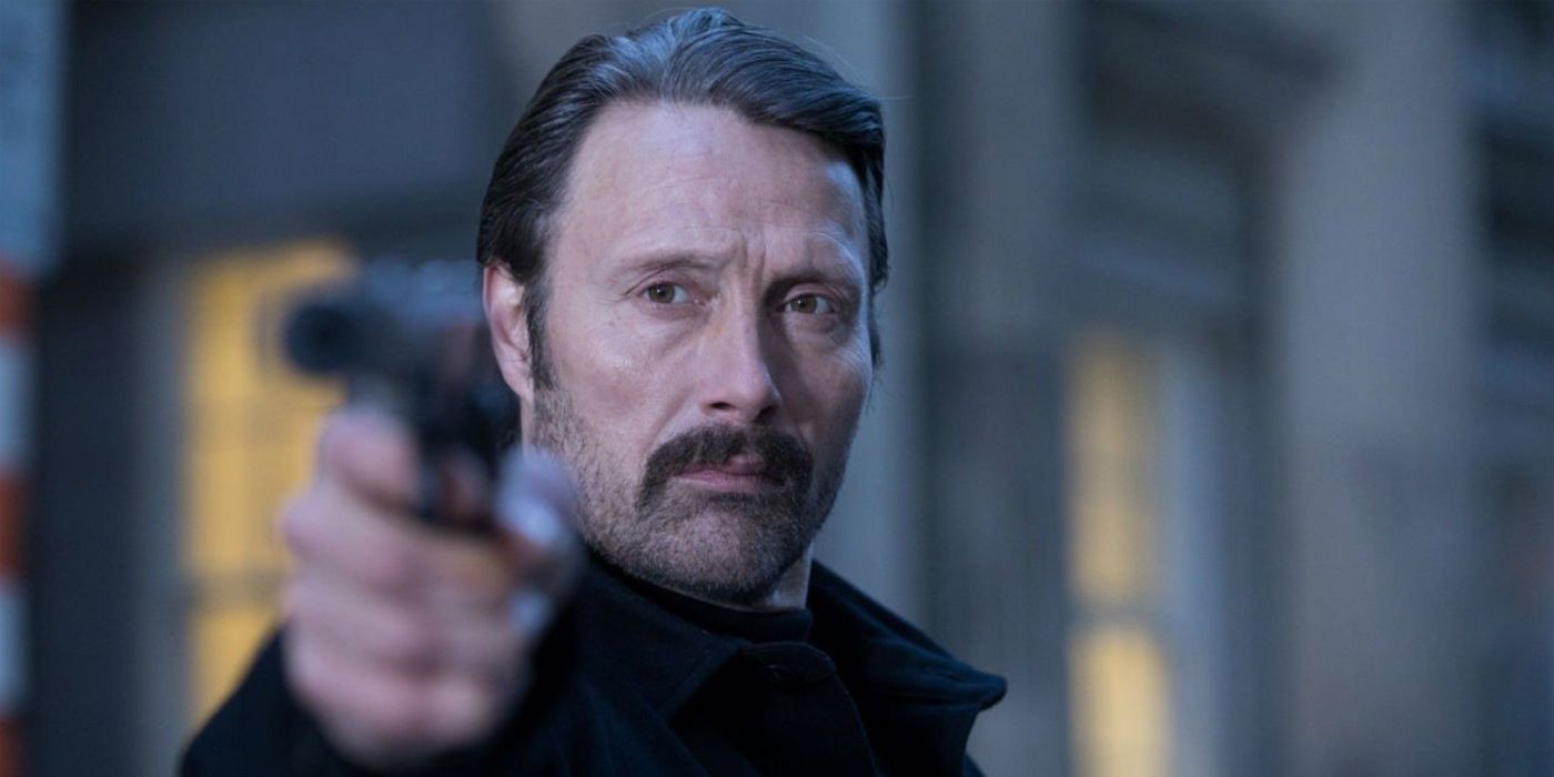 Mads Mikkelsen with gun in Polar