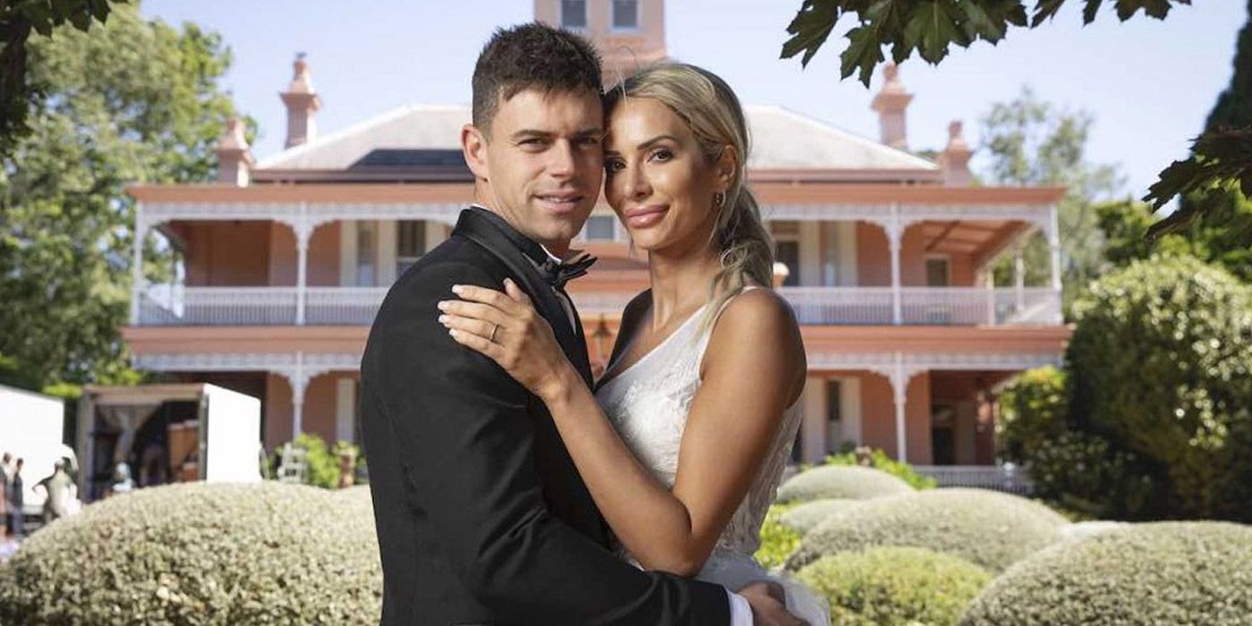 A couple standing in front of a house in Married At First Sight