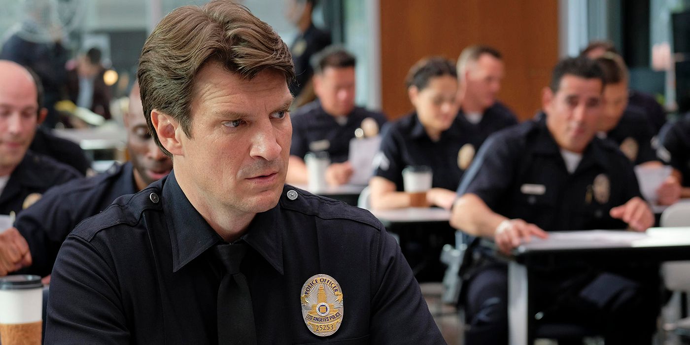 Nathan Fillion as a police officer in a room on The Rookie.
