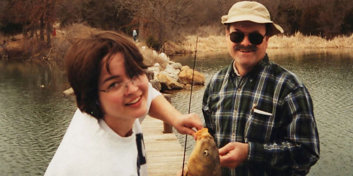 Serial killer Dennis Radar poses with a woman in front of a lake