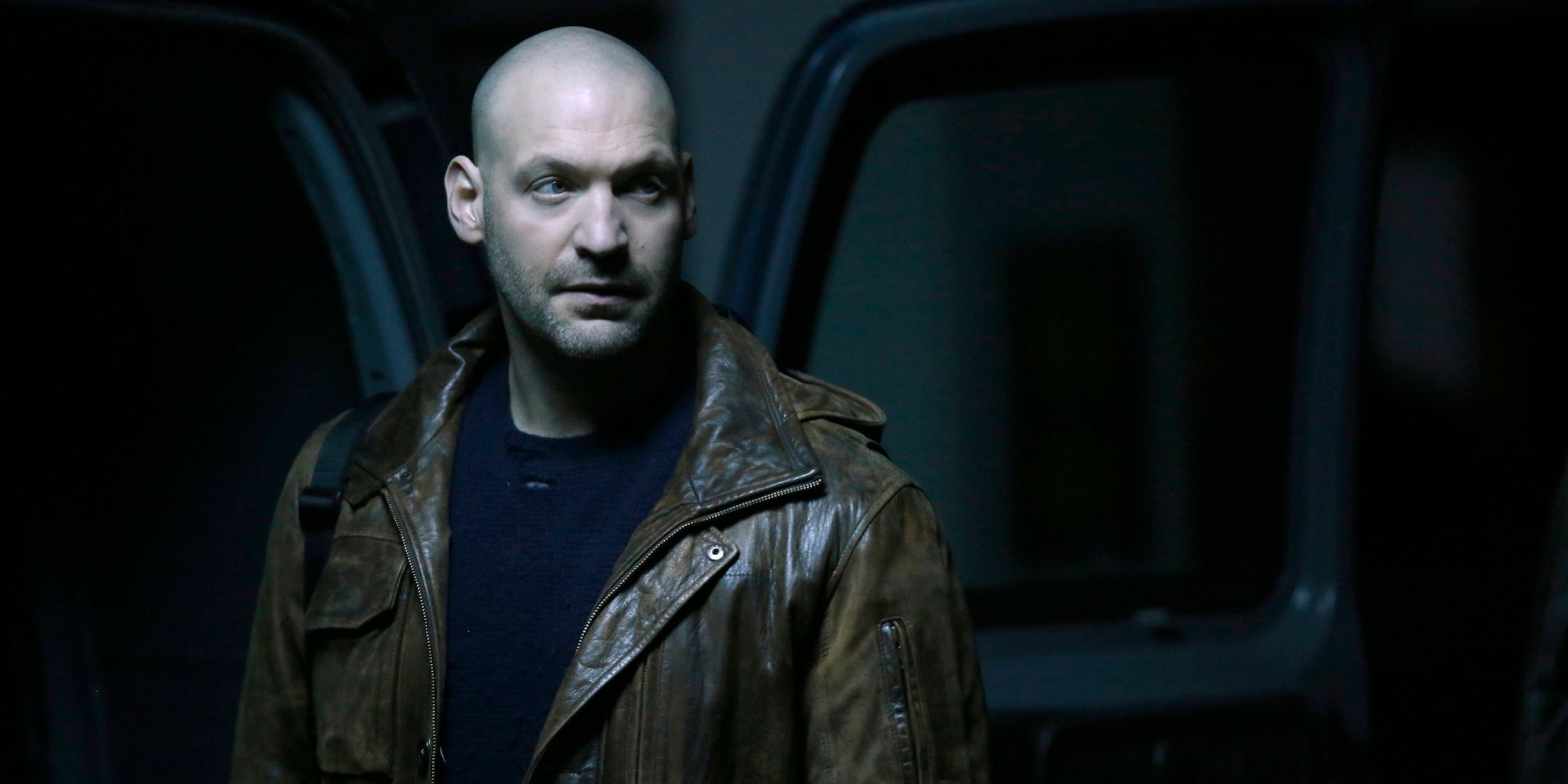 Corey Stoll standing outside a van in The Strain