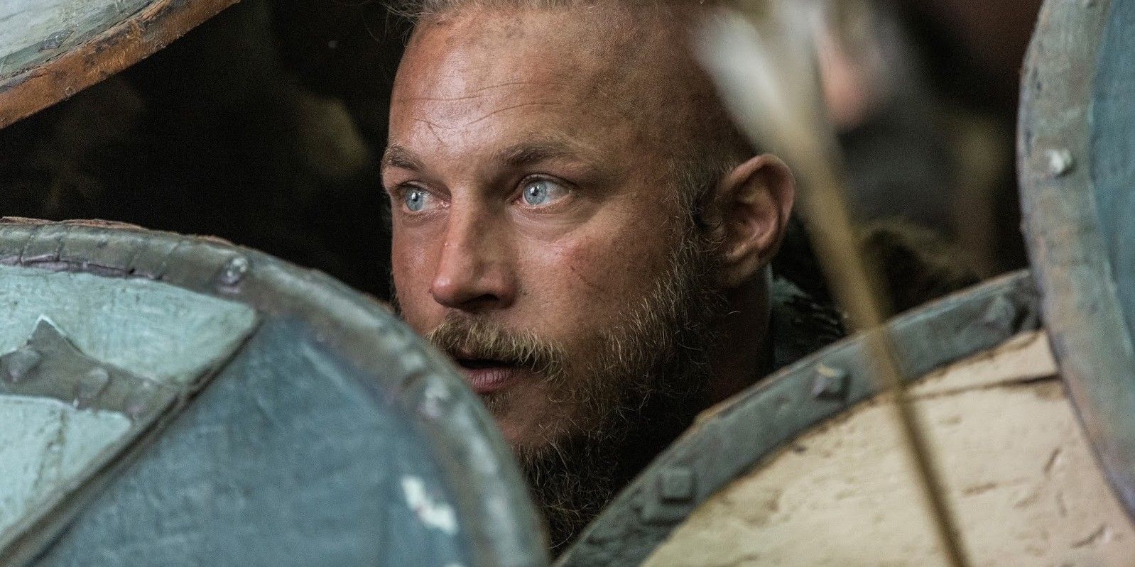 Ragnar behind his shield in Vikings