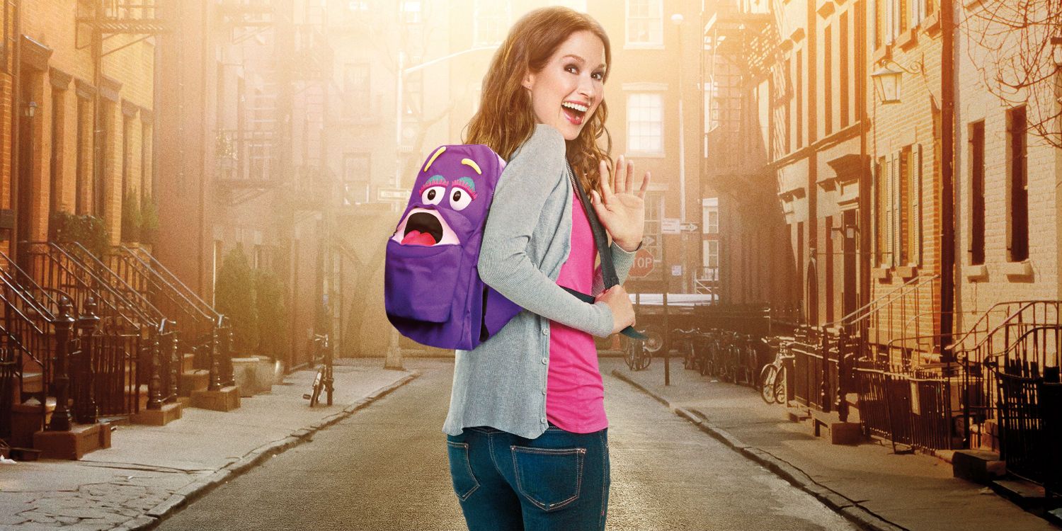 Ellie Kemper in the middle of the road with purple backpack