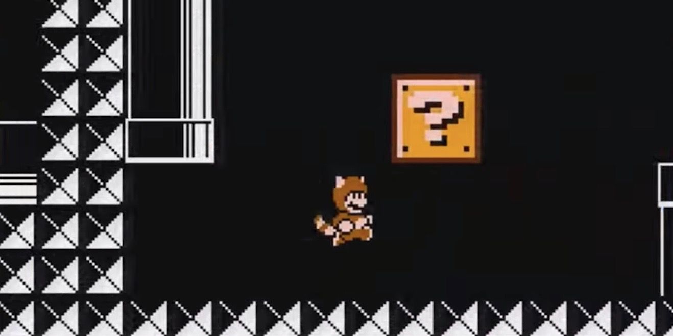 Mario busting a block with a Tanooki Suit in Mario 3