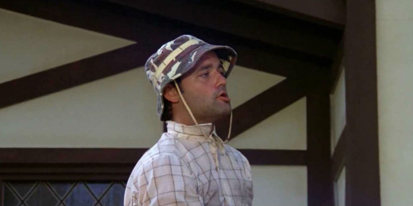 Bill Murray in Caddyshack looking off camera with a hat on.