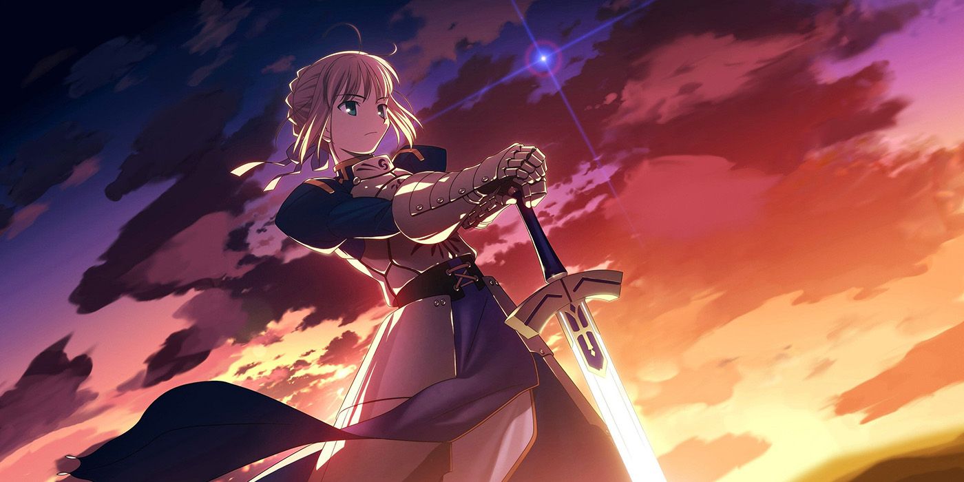 Saber holding her sword in the sunset in Fate/Zero key art