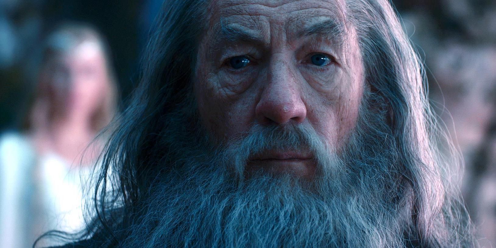 Gandalf in Rivendell with Galadriel behind him in The Hobbit An Unexpected Journey