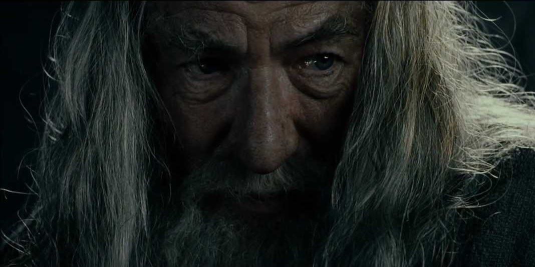 Gandalf looking to talk to Frodo in the Mines of Moria in The Lord of the Rings The Fellowship of the Ring