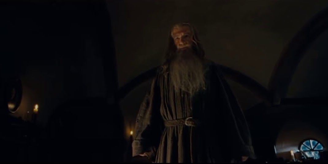 Gandalf making himself look tall and scary in The Lord of the Rings The Fellowship of the Ring