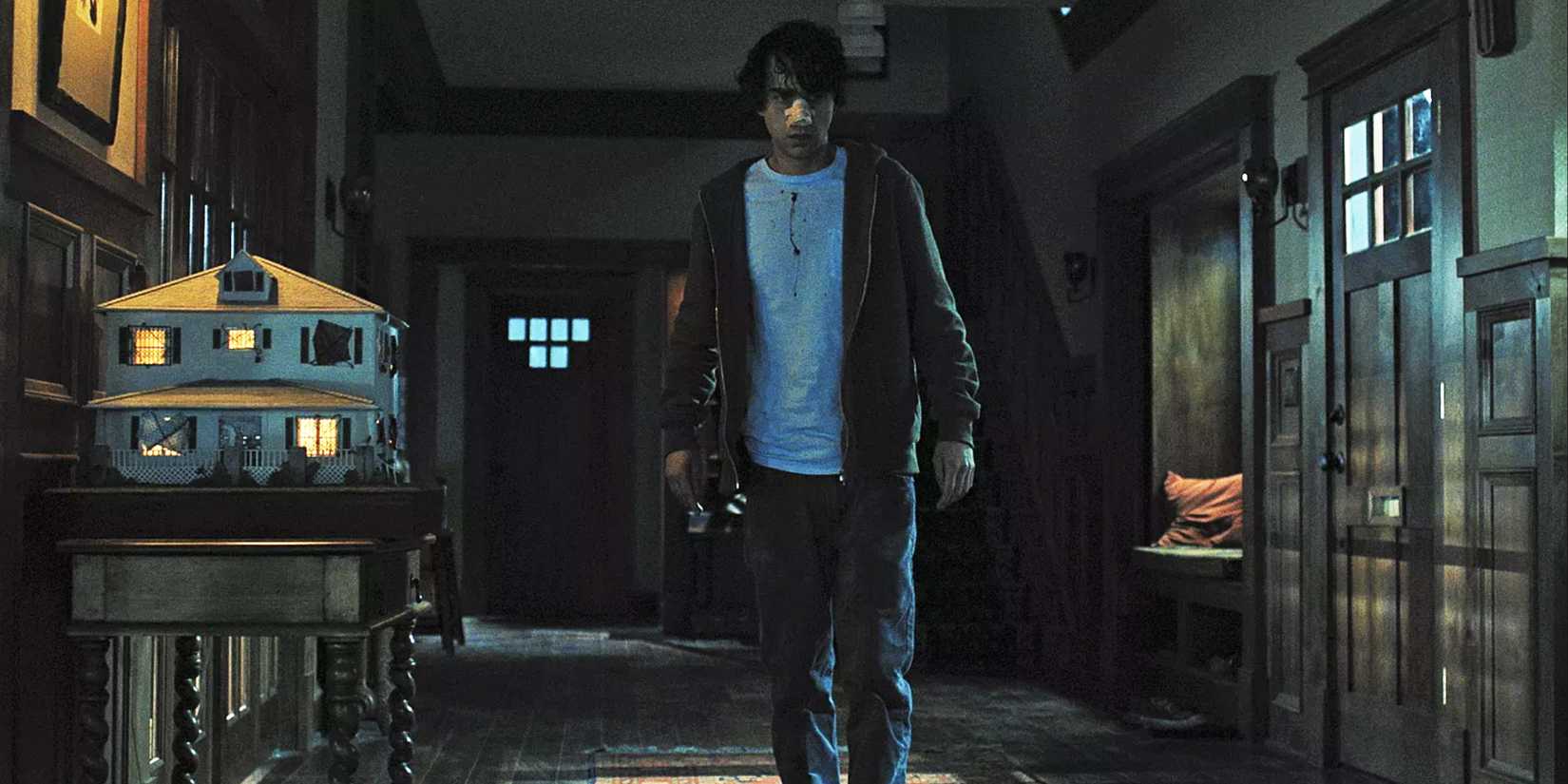 Peter walking around the house in Hereditary