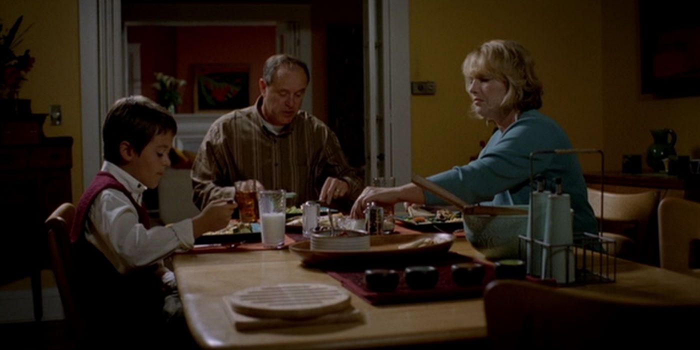 Jesse Pinkman's and his little brother at the dinner table in a scene from Breaking Bad.