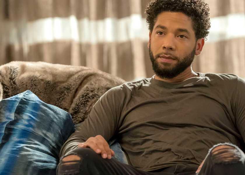 Jussie Smollett sitting in Empire FOX