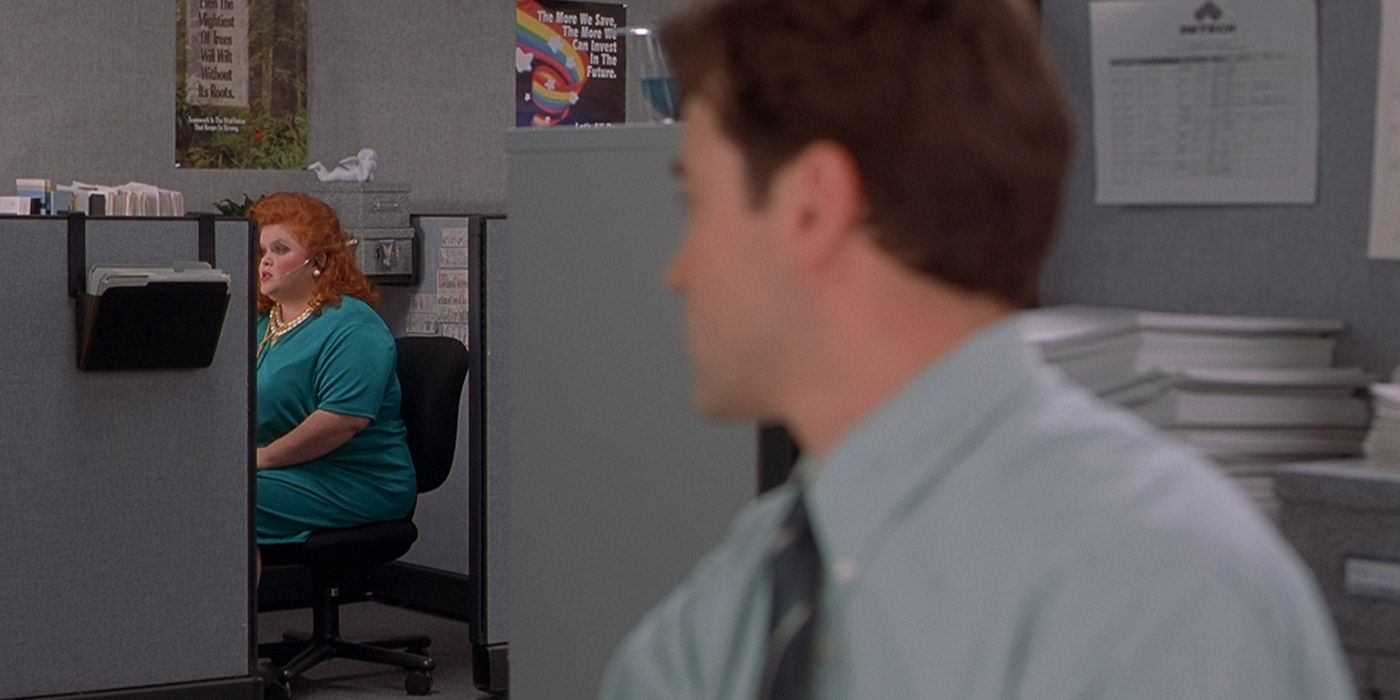 Peter listens to the annoying receptionist in Office Space.