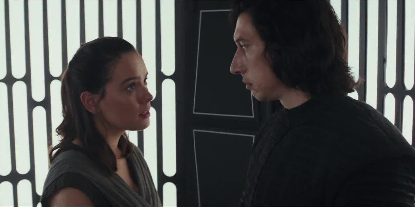 Rey and Kylo talk in an elevator in The Last Jedi