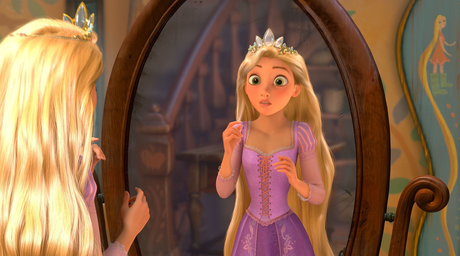 Rapunzel stands in front of a mirror while wearing a tiara