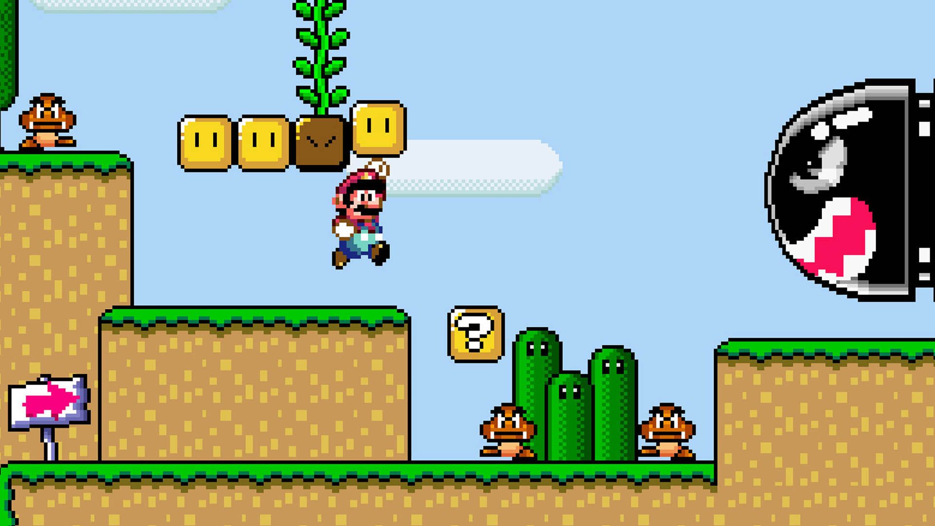Mario jumping and hitting a block in Super Mario World