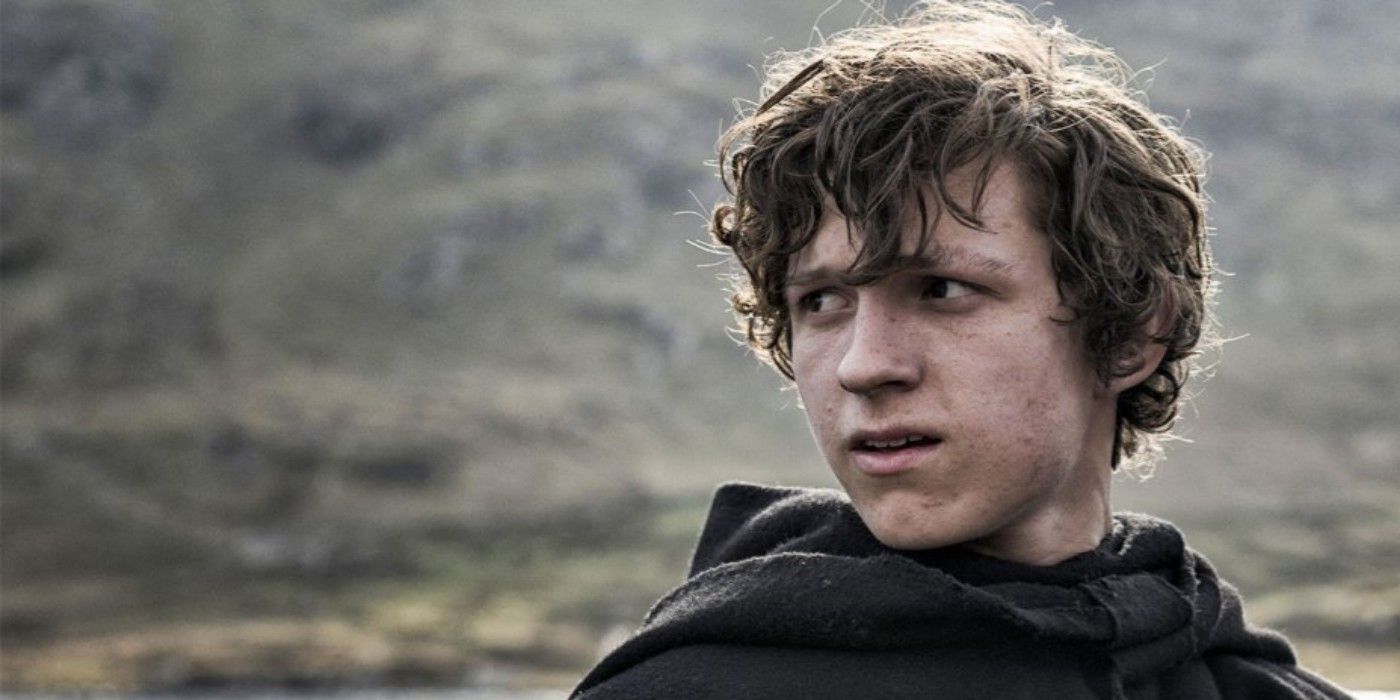 Tom Holland looking off camera in the hills in Pilgrimage.