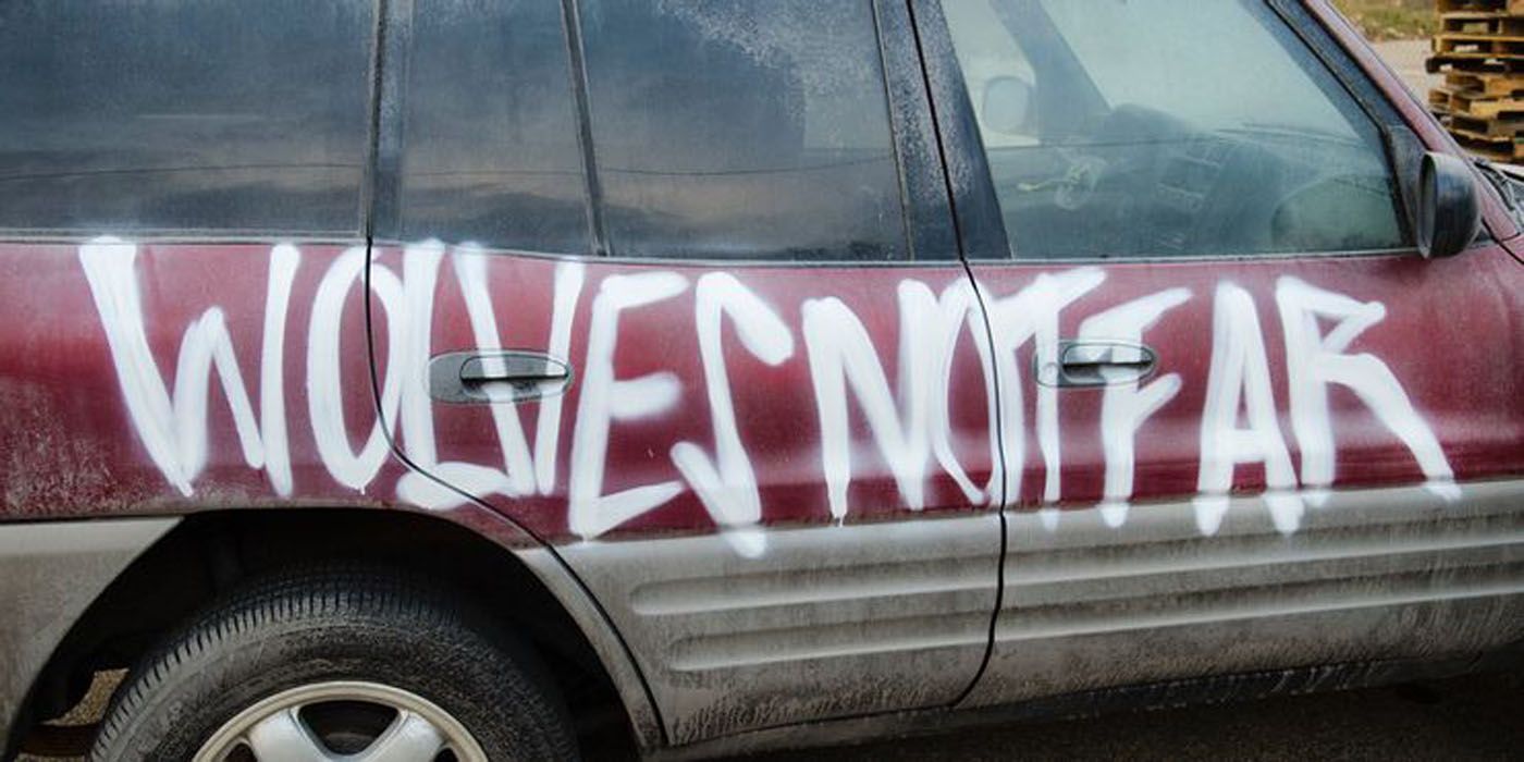 A car with graffiti by the Wolves on The Walking Dead.