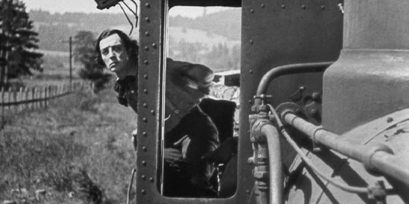Buster Keaton sticking his head out of the train
