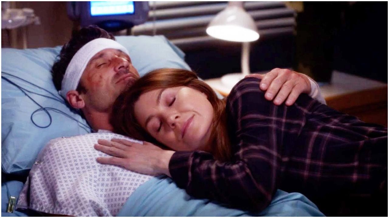 Meredith lying on Derek's chest in hospital