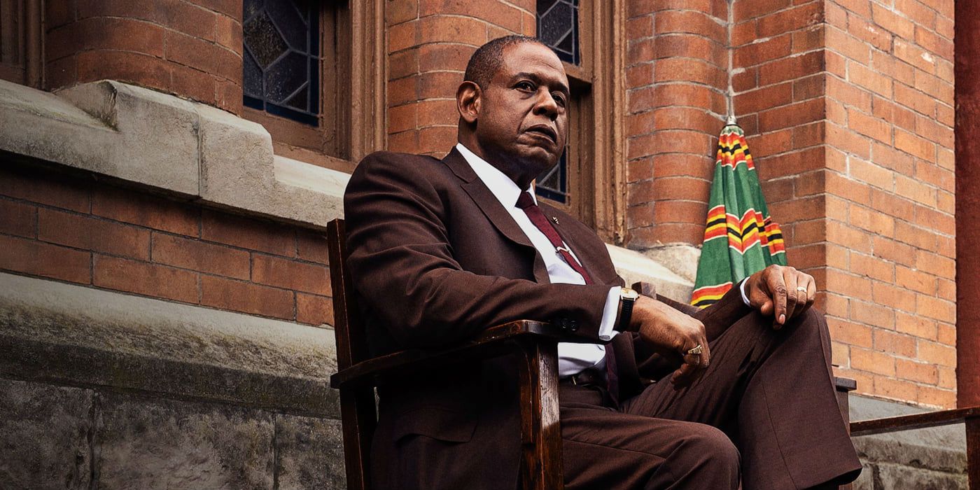 Forest Whitaker sitting down as Bumpy Johnson in Godfather of Harlem