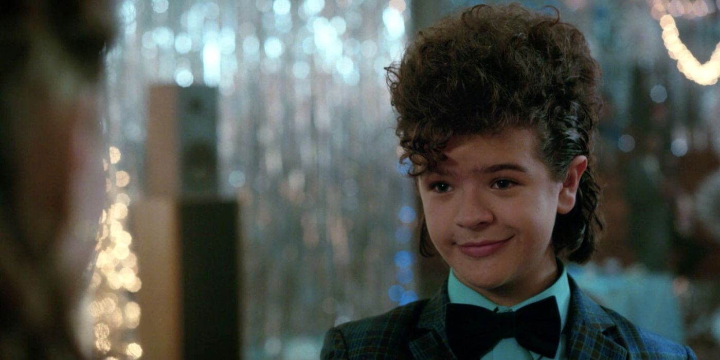 Dustin in a suit at a school dance in Stranger Things