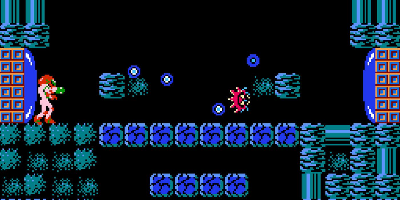 Samus firing on alien creatures in the original 1986 Metroid game
