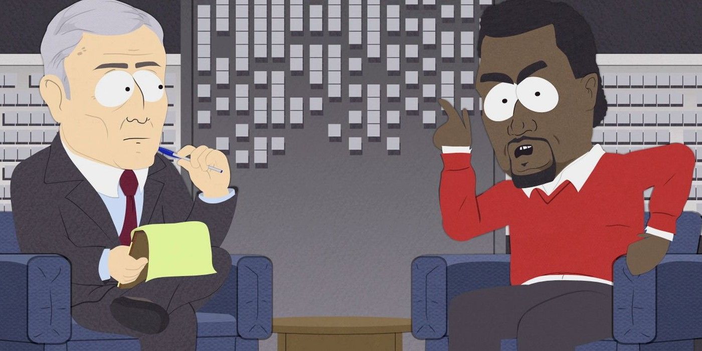 Kanye West looking angry sitting in front of a talk show host in South Park.