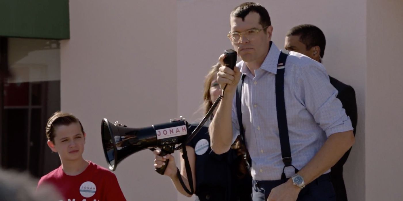 Jonah talking into a microphone in Veep