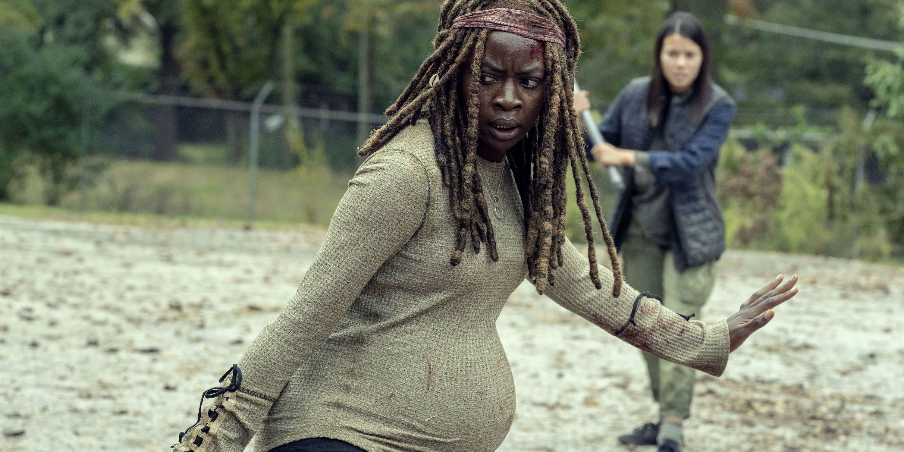 A pregnant Michonne prevents others from approaching in The Walking Dead
