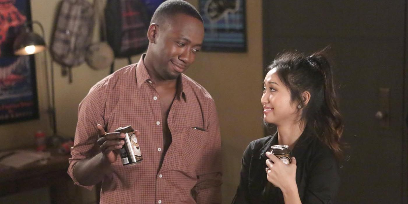Winston and Daisy smile at each other in New Girl