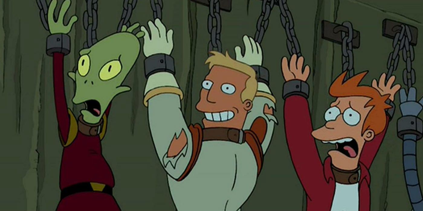 Kif, Zapp, Fry, and Bender chained to a wall in an episode of Futurama.
