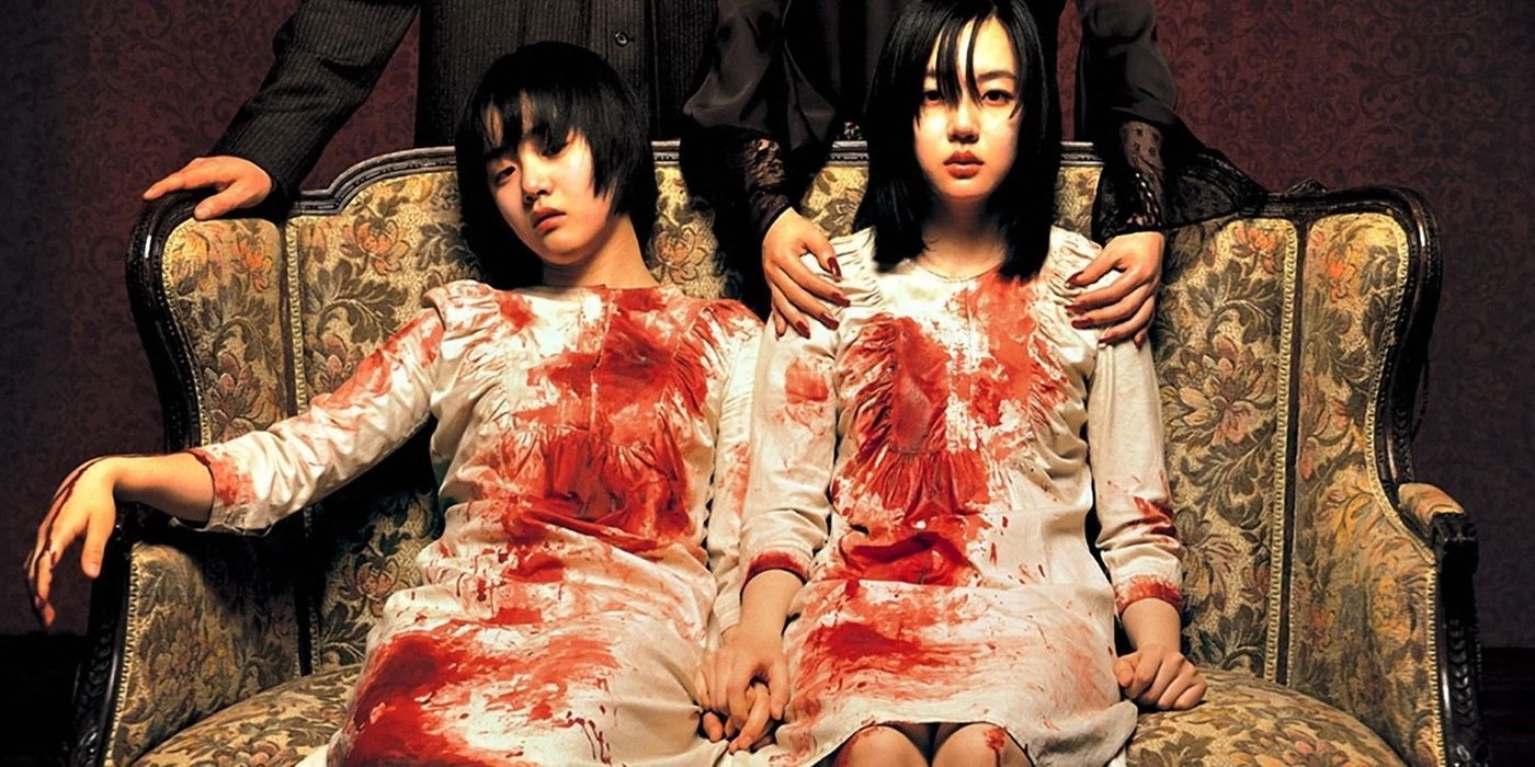 Two sisters covered in blood next to each other in A Tale Of Two Sisters