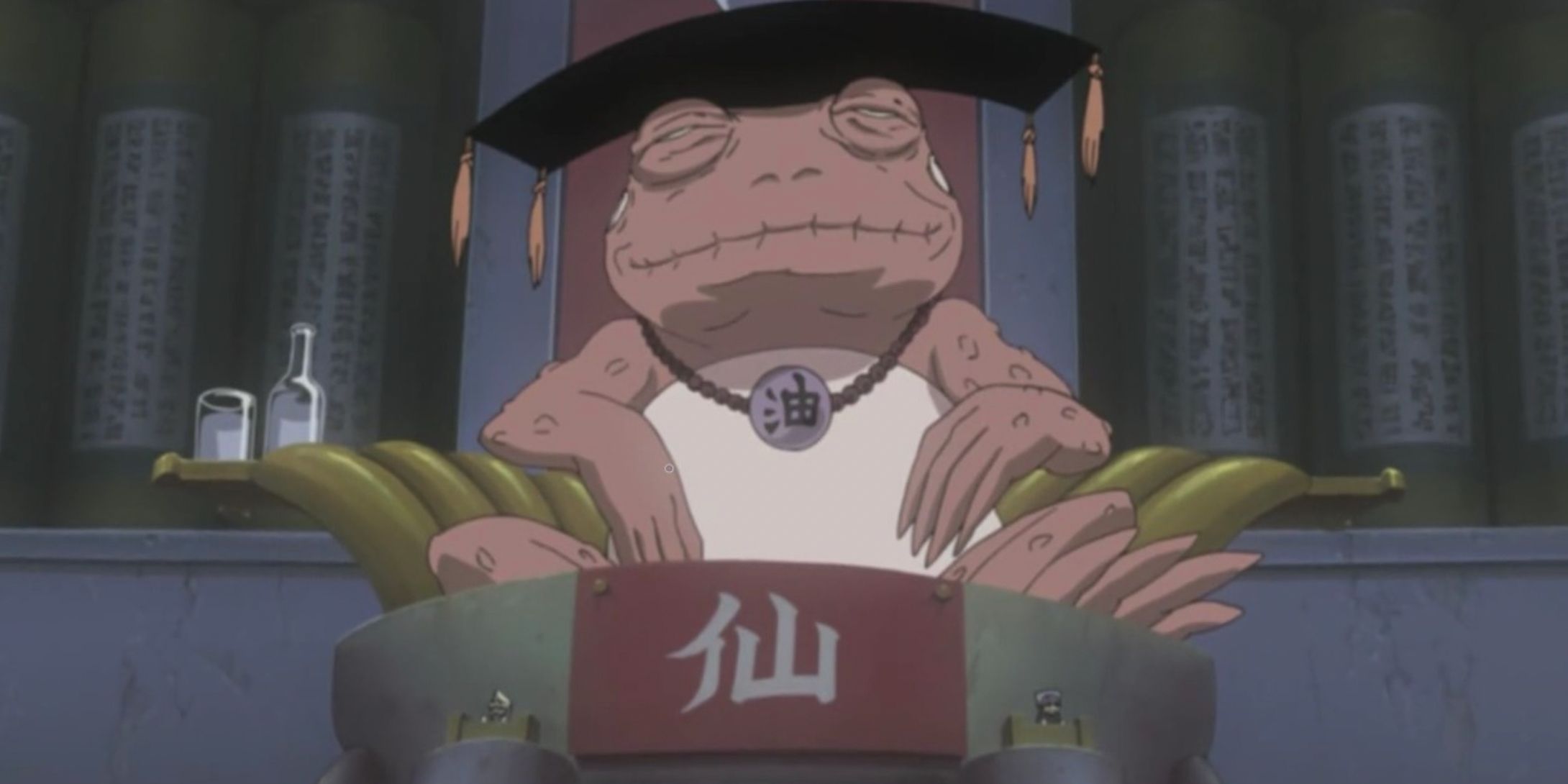 A great toad sage sits in a chair in Naruto
