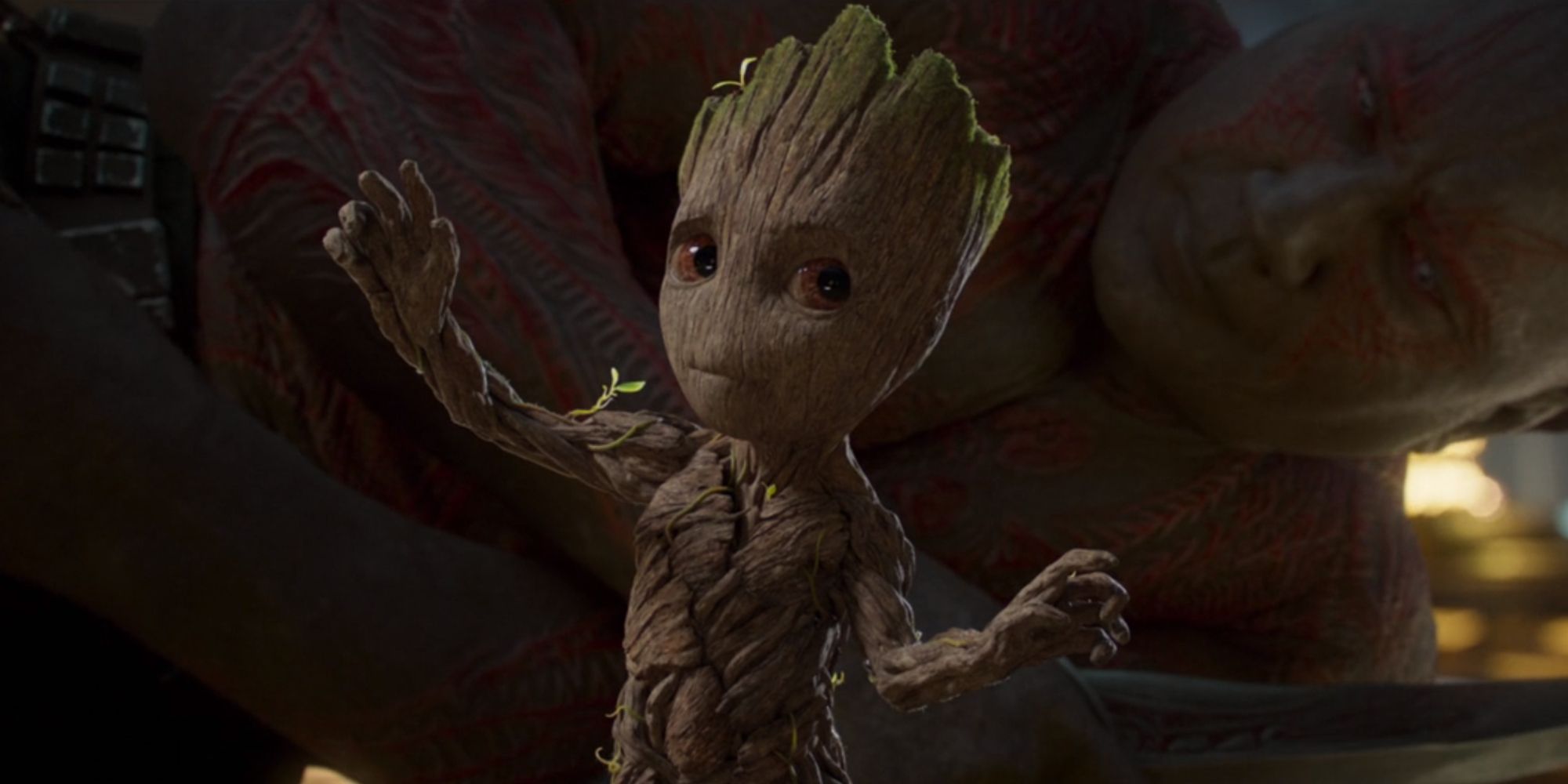 Baby Groot frozen in place before Drax in Guardians Of The Galaxy Vol. 2
