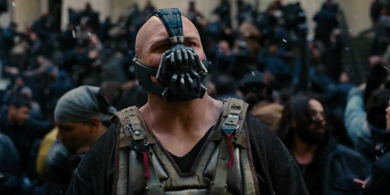 Bane fights with Batman during the brawl between henchman and police-men in The Dark Knight Rises
