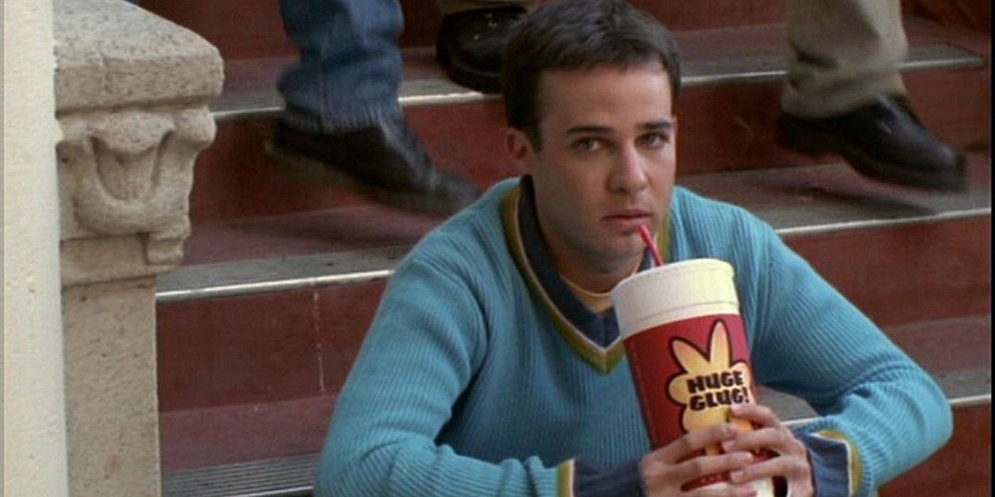 Jonathan sitting on the school steps alone with a slushie on Buffy the Vampire Slayer