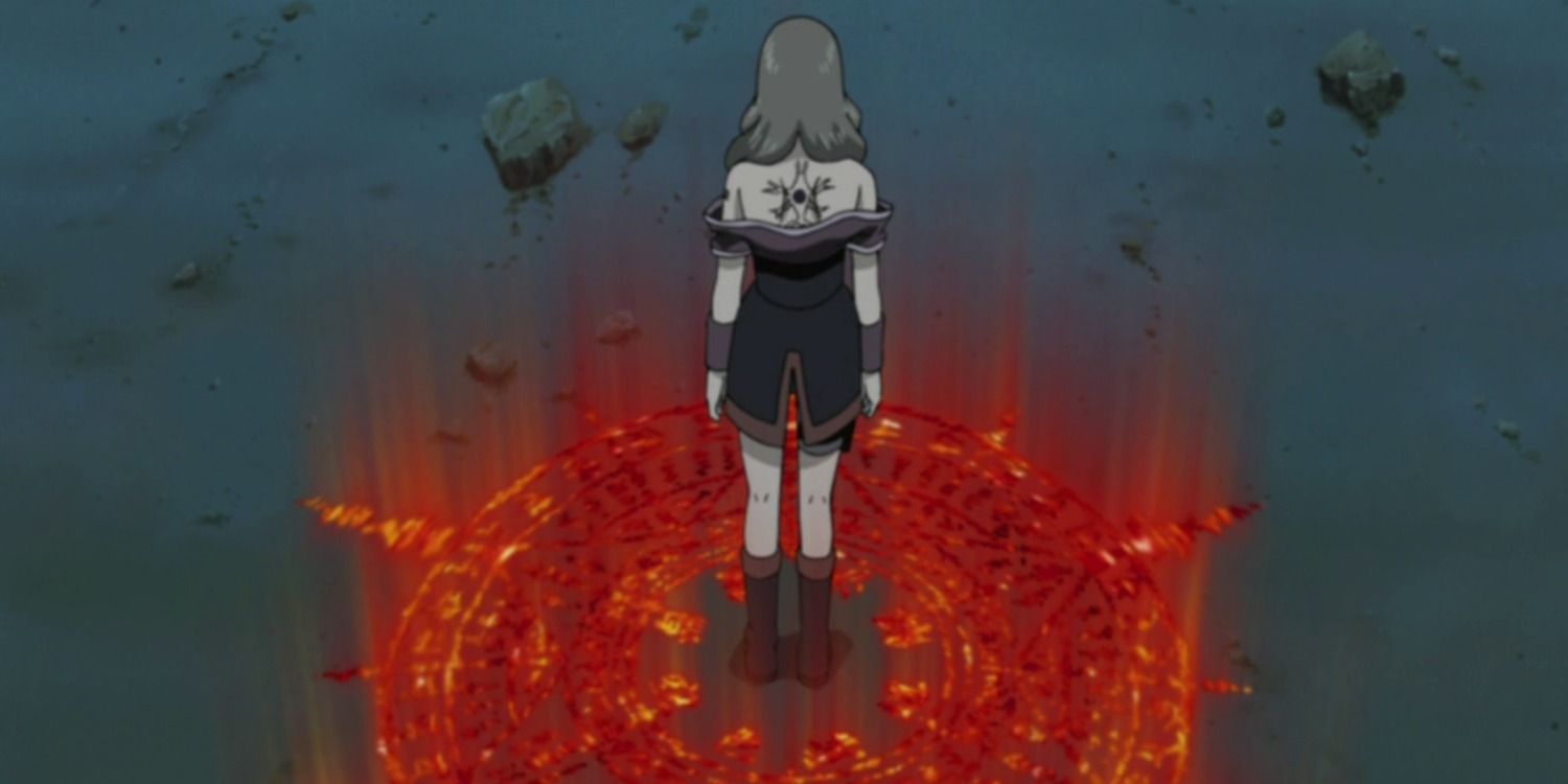 Hotaru Tsuchigumo has the clan symbol embedded in her back as she stands in the middle of the symbol for the jutsu in Naruto
