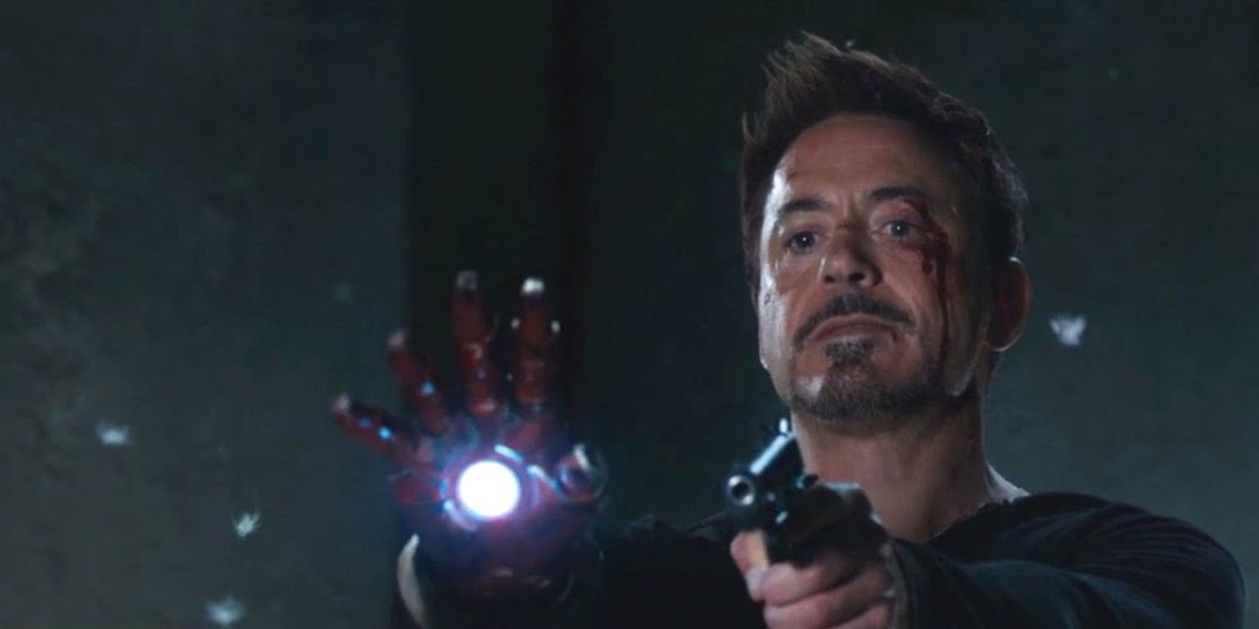 Tony Stark aiming a gun in Iron Man 3