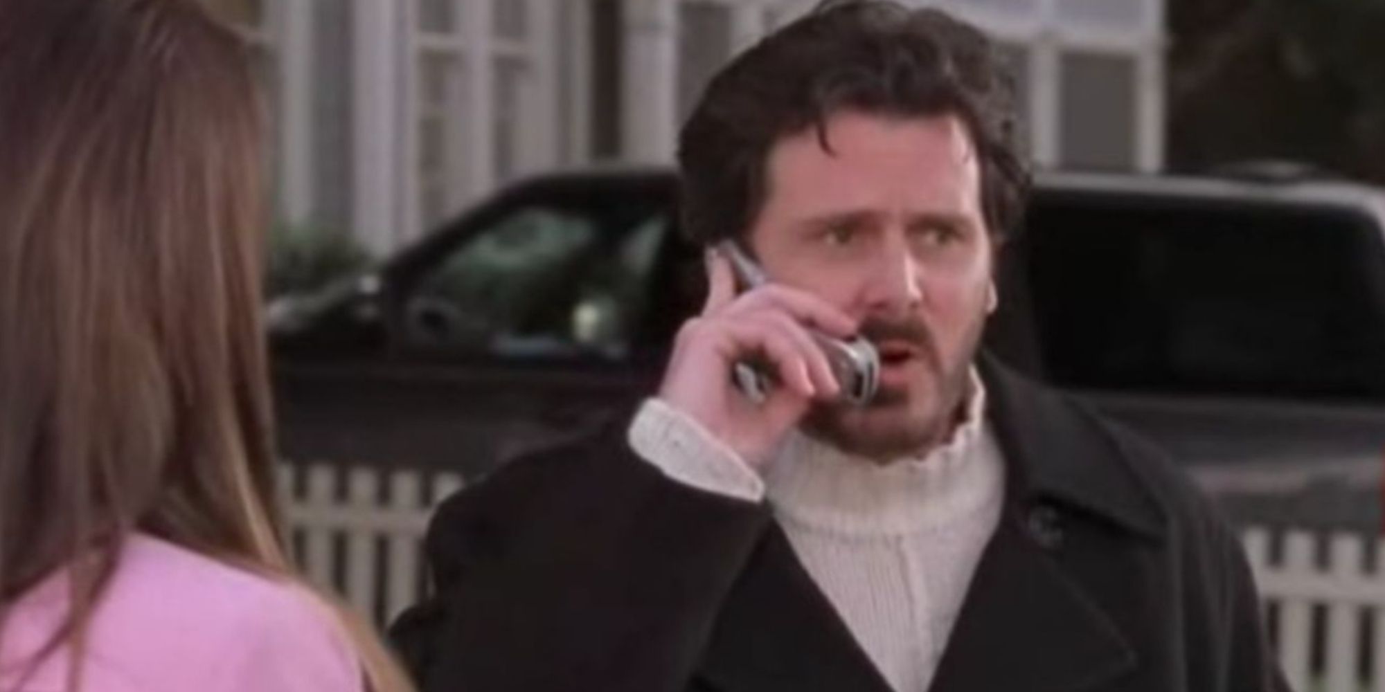 Jason on the phone in front of Lorelai on Gilmore Girls