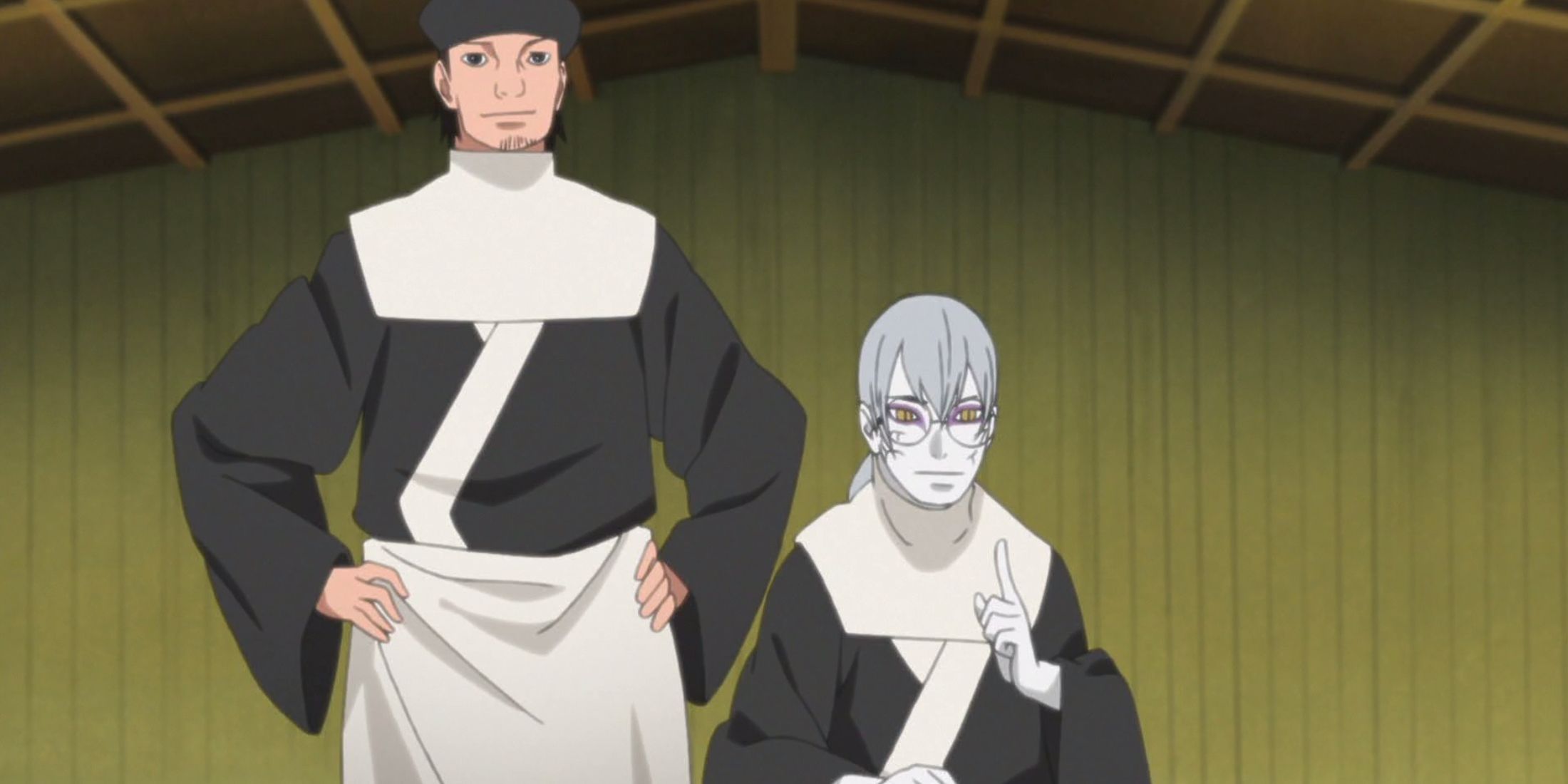 Kabuto sits while another character stands next to him in Boruto
