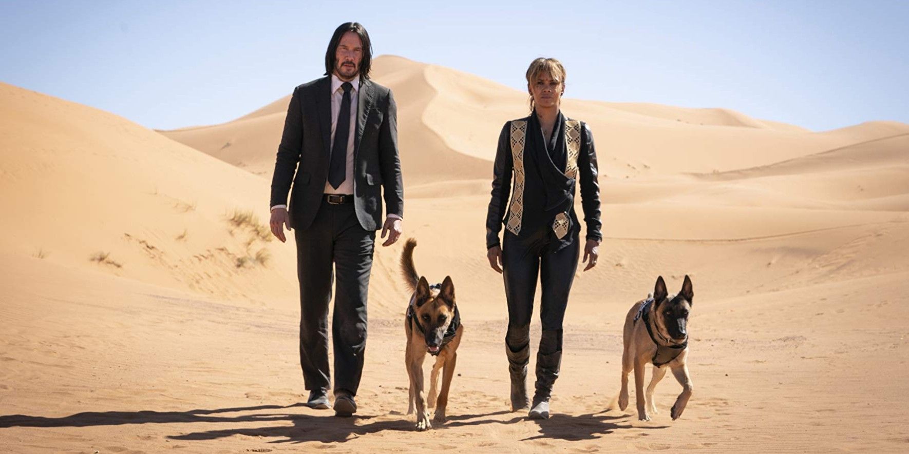 John Wick walks through the desert with his dog in Chapter 3- Parabellum
