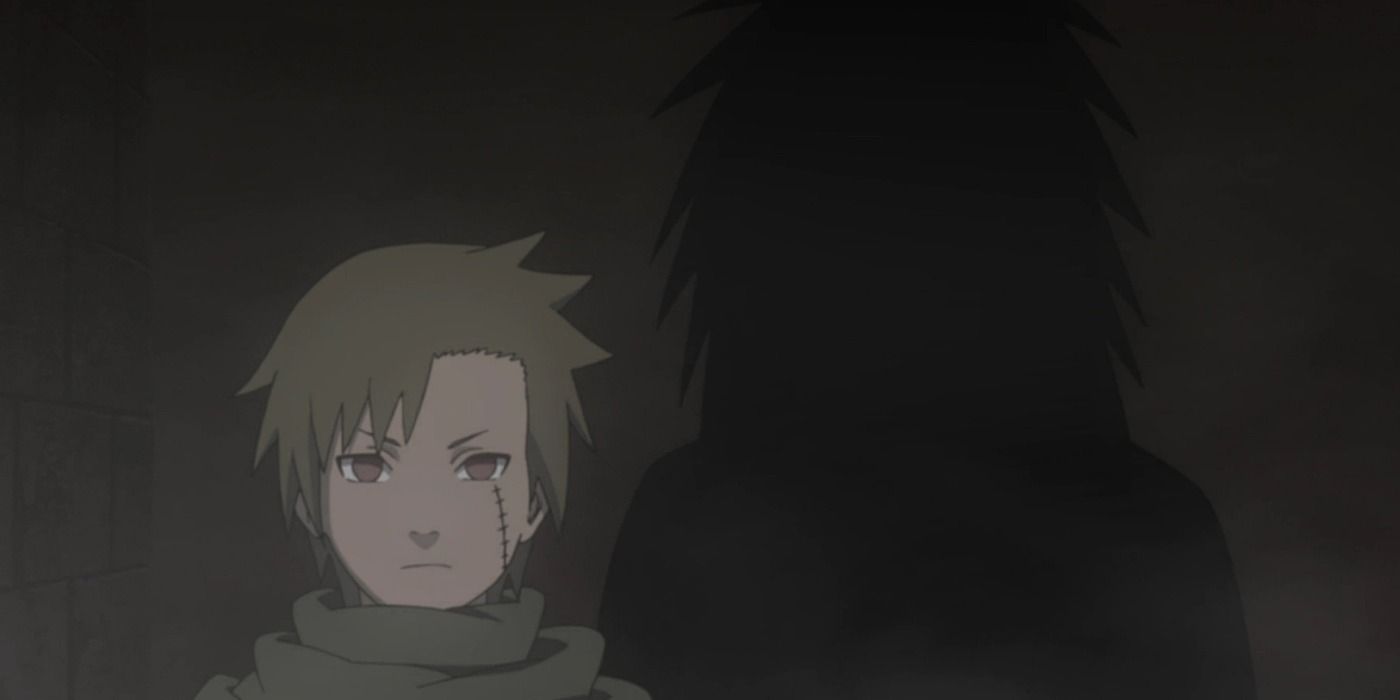 Yagura Karatachi stands in shadow in Naruto with a mysterious figure